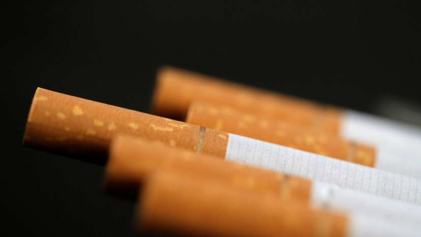 An illustration picture shows cigarettes in their pack