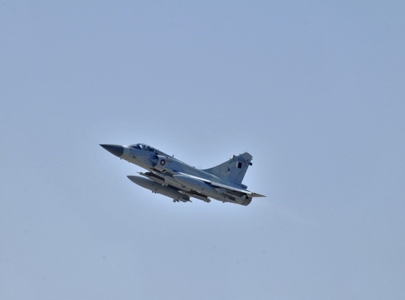 A Qatar Emiri Air Force Dassault Mirage 2000-5 fighter jet takes off as part of a Joint Task Force Odyssey Dawn mission in Souda Bay in Greece