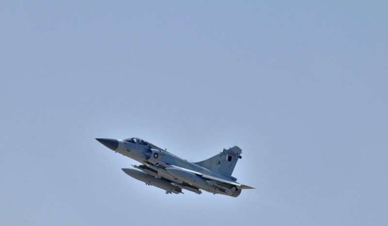 A Qatar Emiri Air Force Dassault Mirage 2000-5 fighter jet takes off as part of a Joint Task Force Odyssey Dawn mission in Souda Bay in Greece