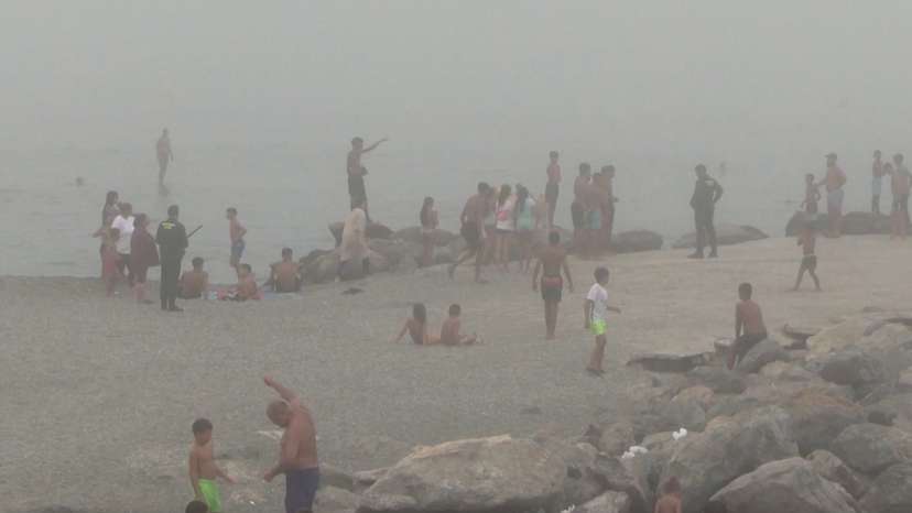Migrants swim to El Tarajal beach