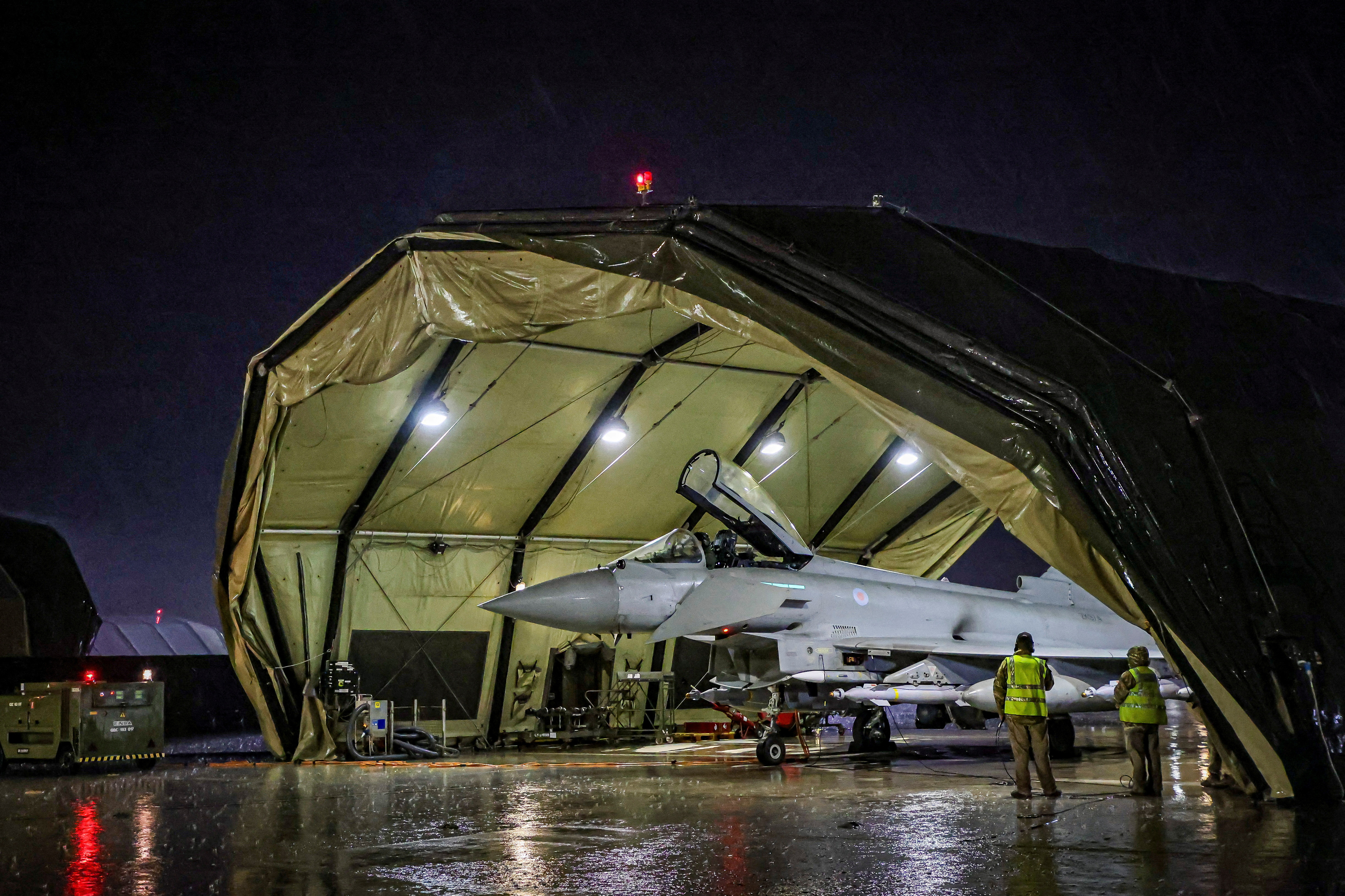 Royal Air Force Typhoon aircraft conduct precision strike operations