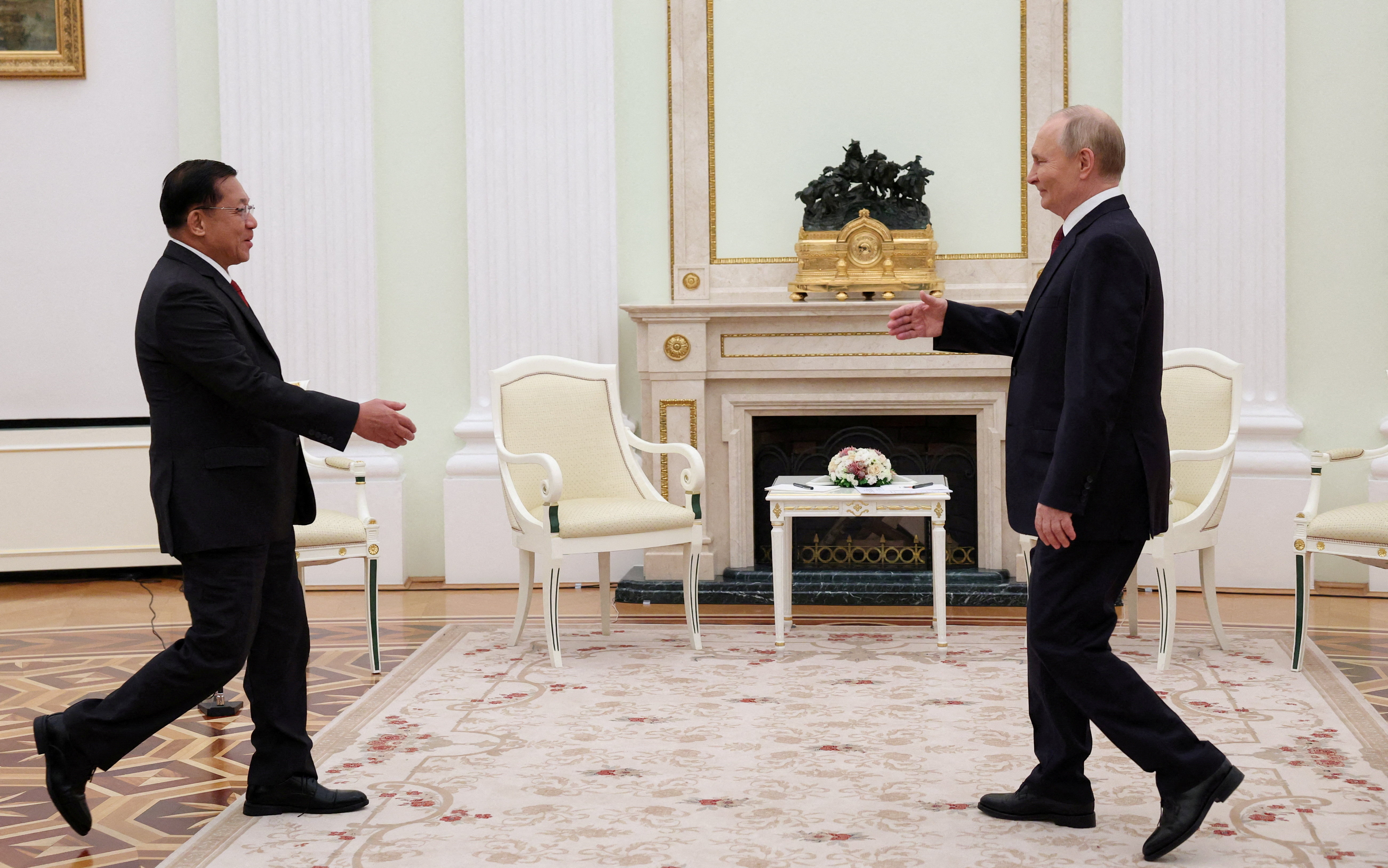 FILE PHOTO: Russia's President Vladimir Putin and Myanmar's military chief Min Aung Hlaing meet in Moscow
