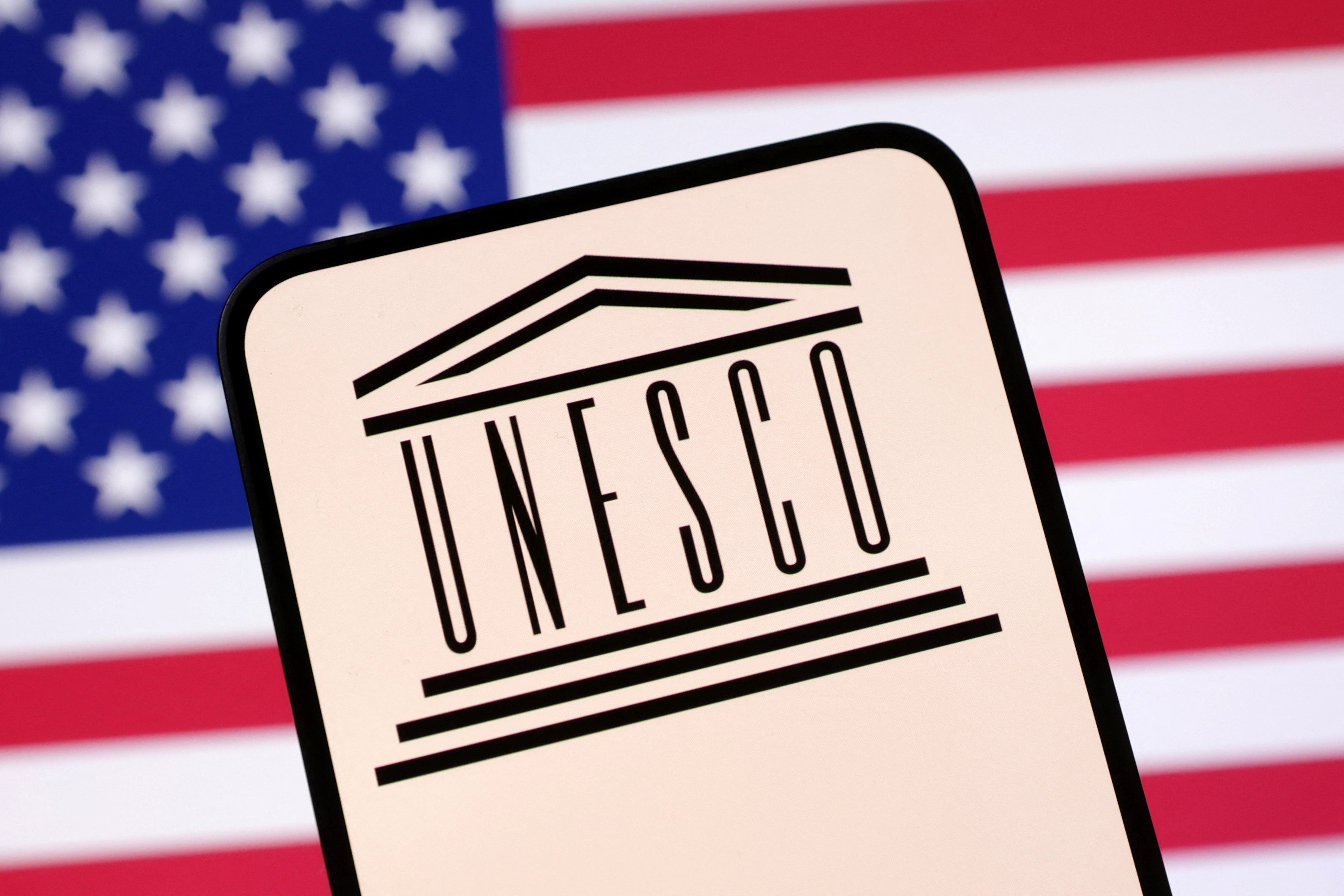 Illustration shows UNESCO logo and U.S. flag