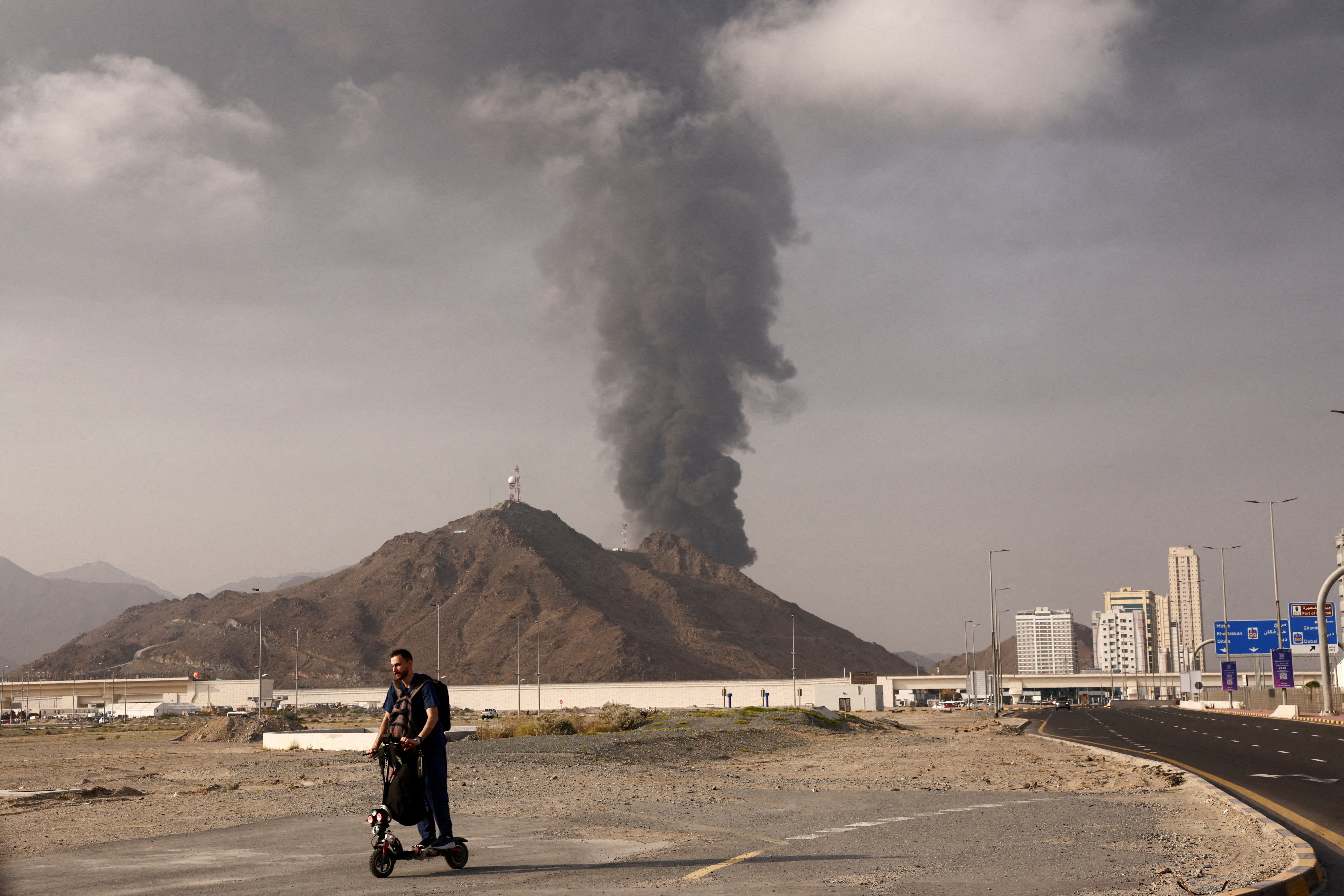 FILE PHOTO: Smoke rises in the Fujairah oil industry zone amid the U.S.-Israel conflict with Iran