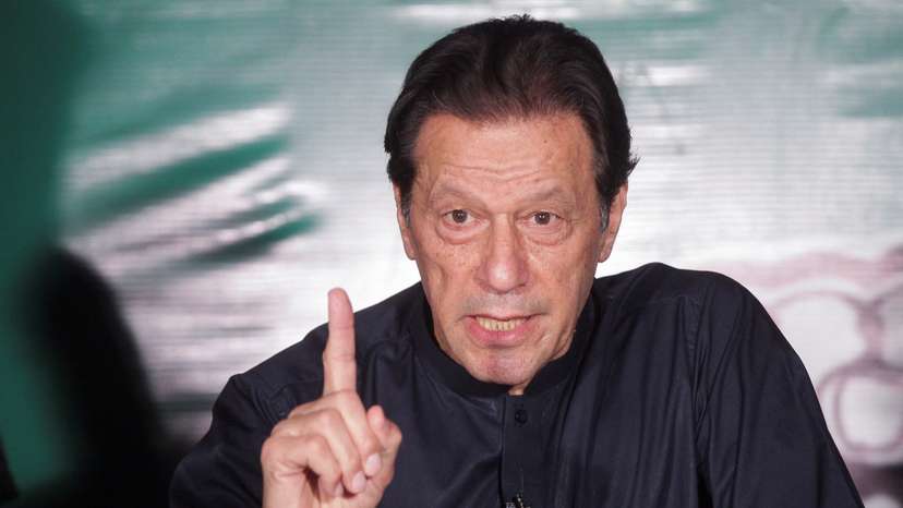 Pakistan's former Prime Minister Imran Khan, gestures as he speaks to the members of the media at his residence in Lahore