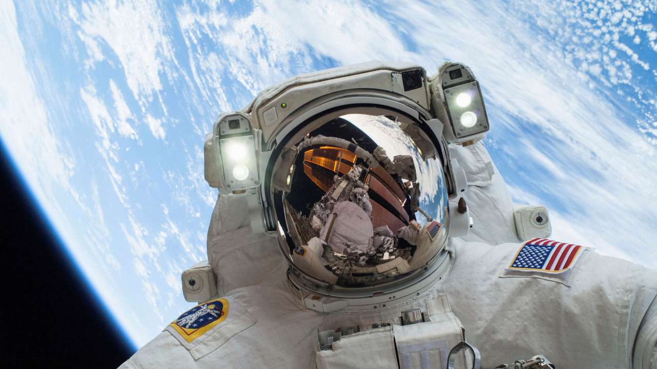 FILE PHOTO: NASA handout of astronaut participating in a spacewalk