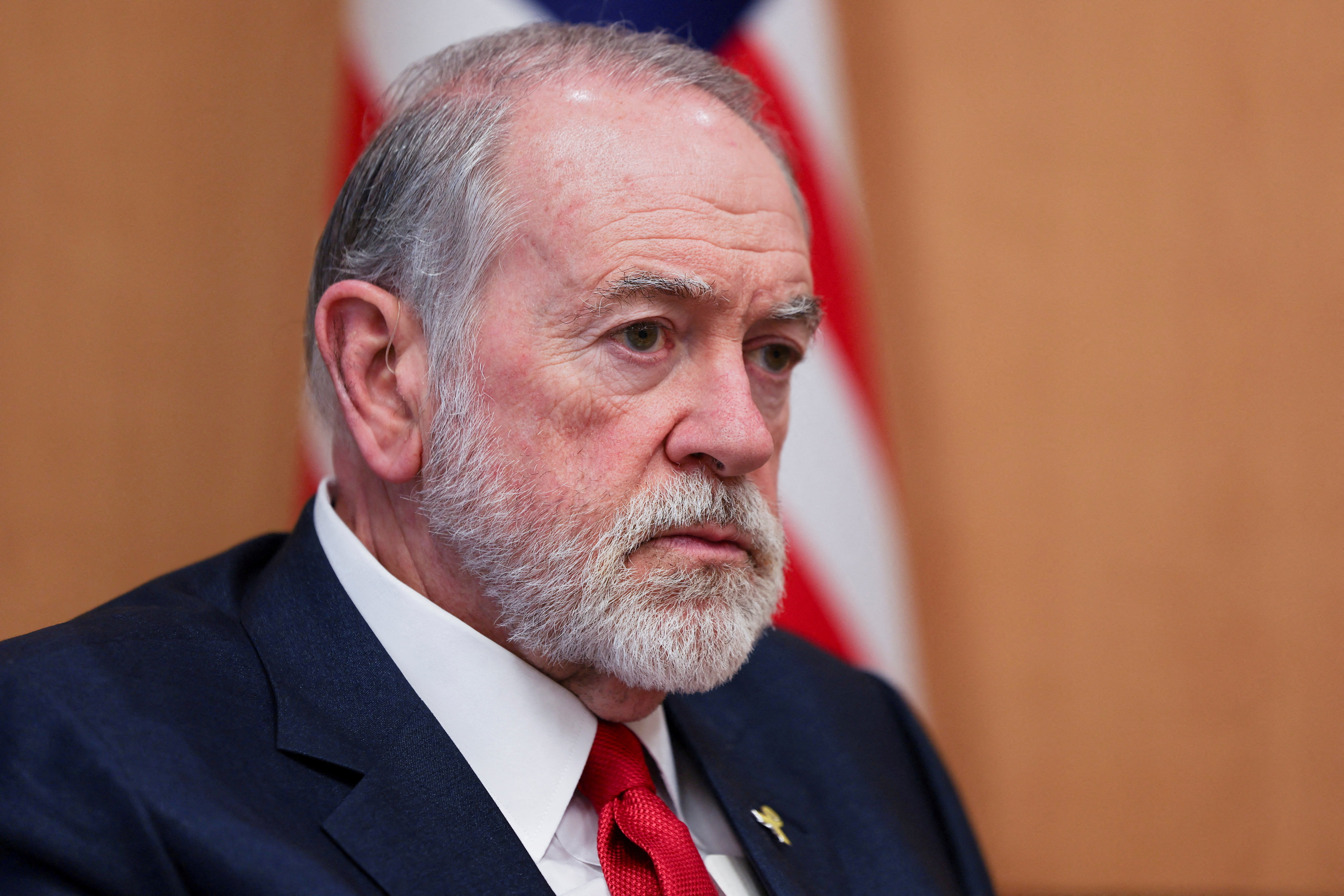 FILE PHOTO: U.S. Ambassador to Israel Mike Huckabee attends an interview with Reuters at his office in the U.S. Embassy in Jerusalem