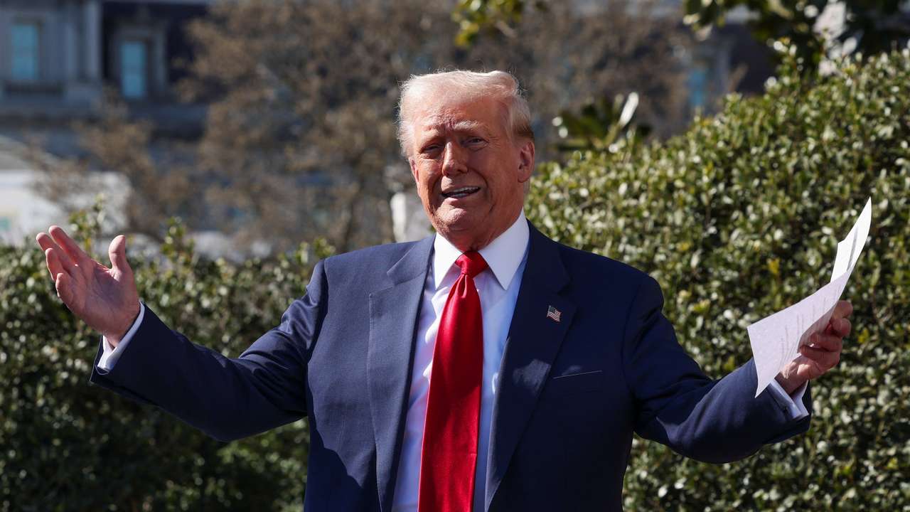 U.S. President Donald Trump views a Tesla car at the White House in Washington