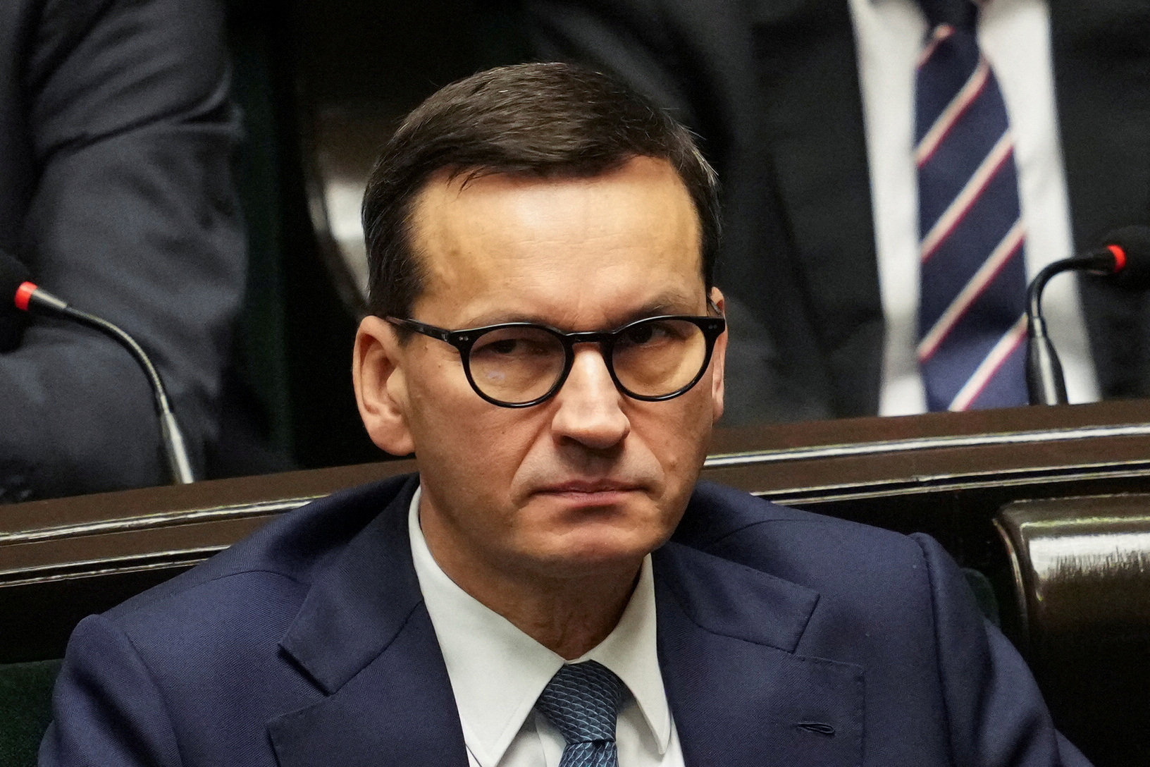 FILE PHOTO: Former Polish PM Morawiecki attends new government's programme presentation in Warsaw