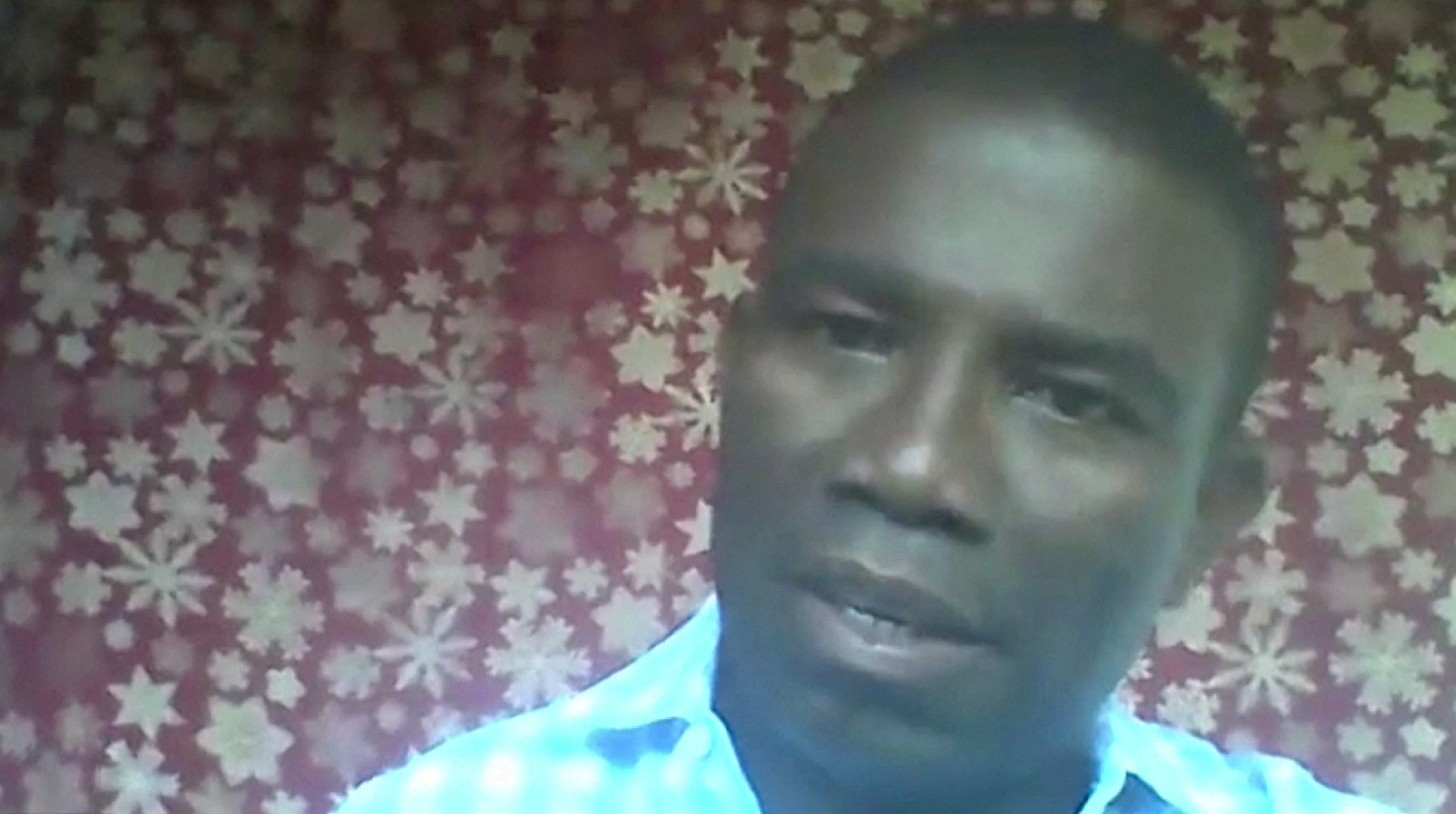 Haitian politician Guy Philippe speaks during an interview with Reuters over Zoom from Haiti