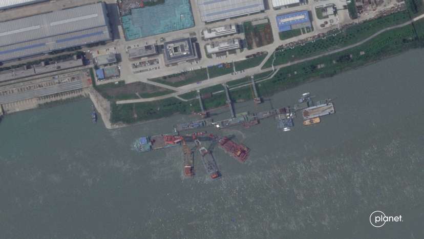 A series of satellite images from Planet Labs from June appear to show cranes at the Wuchang shipyard