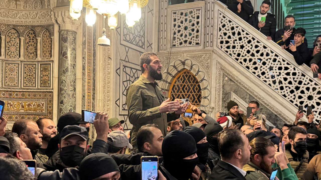 FILE PHOTO: Top rebel commander Abu Mohammed al-Golani speaks to a crowd at Ummayad Mosque in Damascus