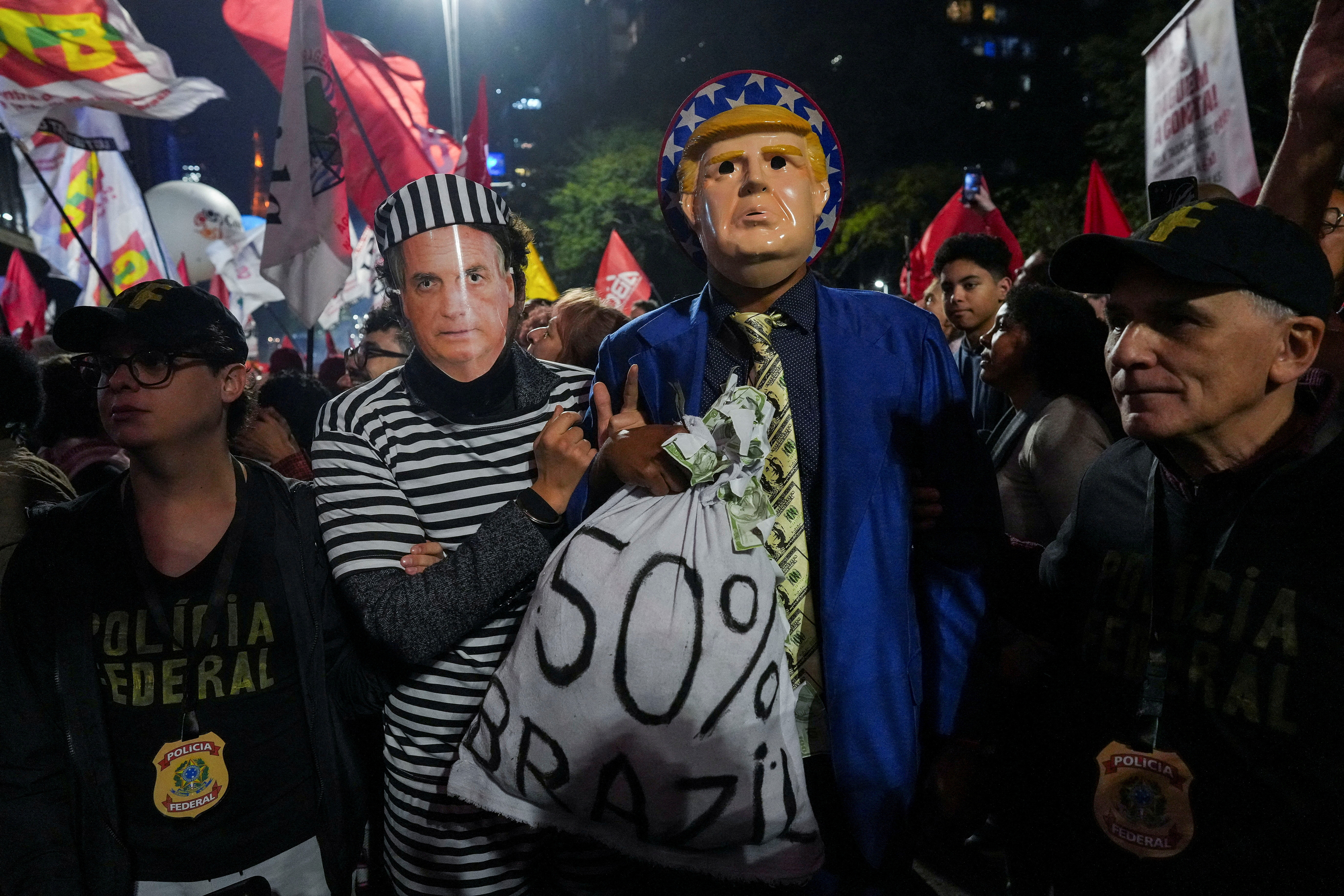 FILE PHOTO: Demonstrators take part in a protest against U.S. President Donald Trump’s announcement of 50% tariffs on Brazilian products, in Sao Paulo