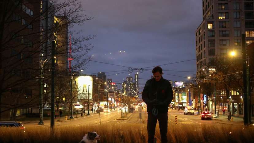 Justinas Stankus walks his dog in Toronto