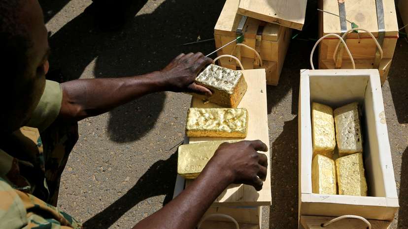 FILE PHOTO: Sudanese Rapid Support Forces (RSF) display gold bars seized from a plane that landed at Khartoum Airport in an investigation into possible smuggling, in Khartoum