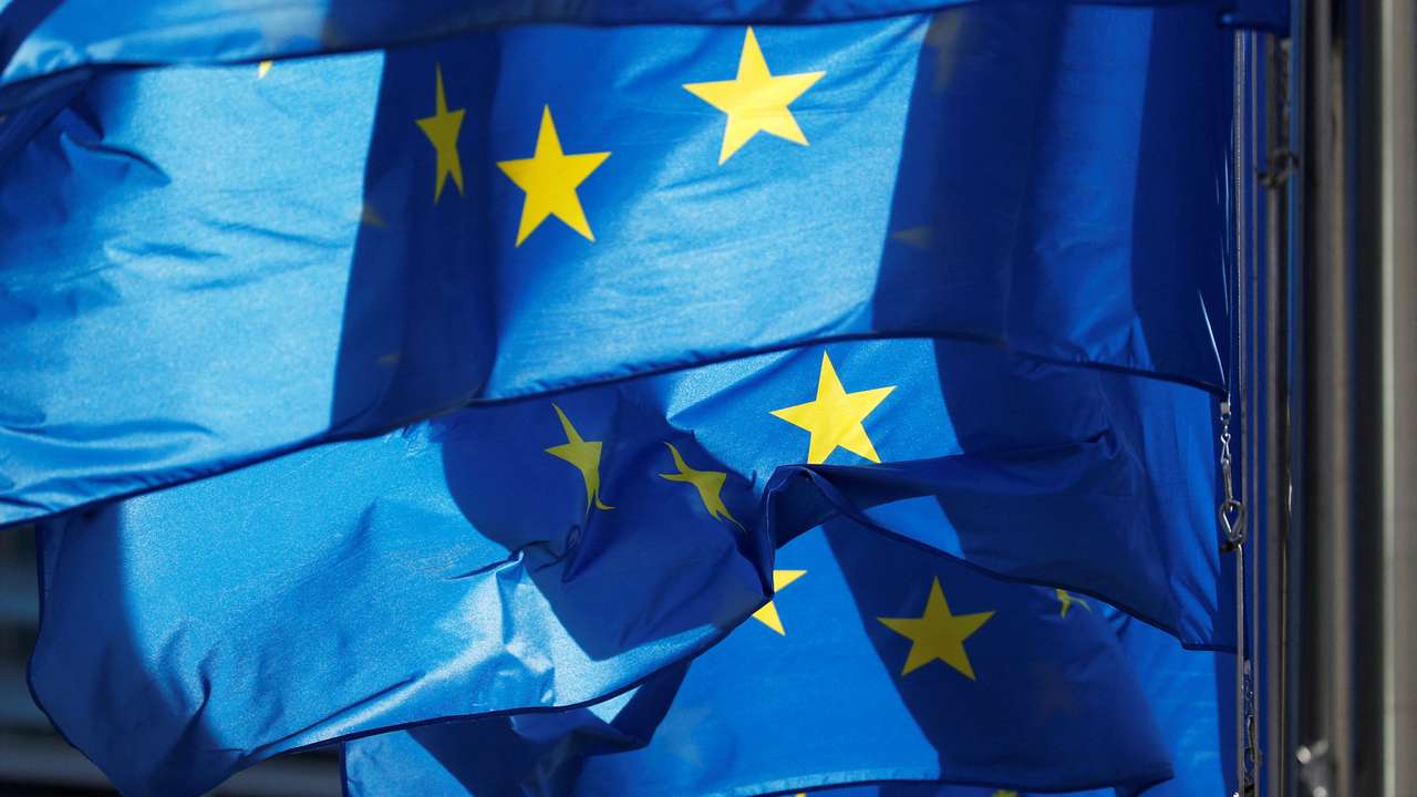 EU flags are seen outside the EU Commission headquarters in Brussels