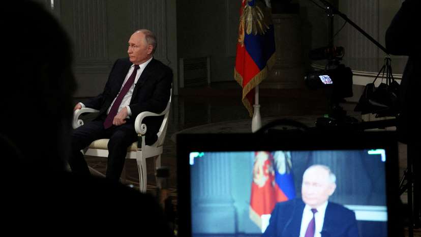 FILE PHOTO: Russian President Vladimir Putin gives interview to U.S. television host Tucker Carlson in Moscow