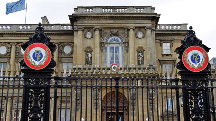 FILE PHOTO: Flags fly from the roof of France's Foreign and European Affairs Ministry in Paris