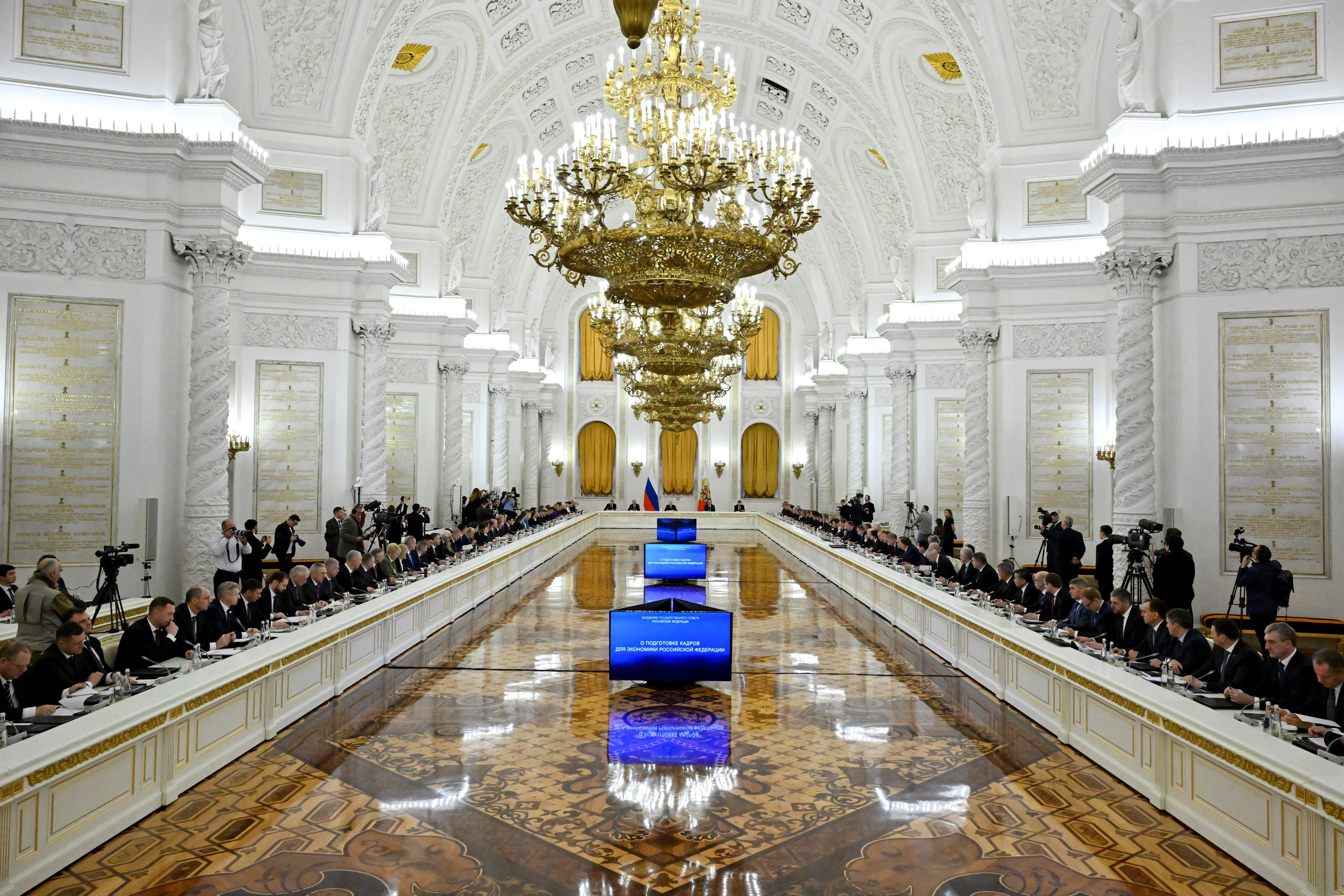 Russian President Vladimir Putin chairs a State Council meeting at the Kremlin in Moscow