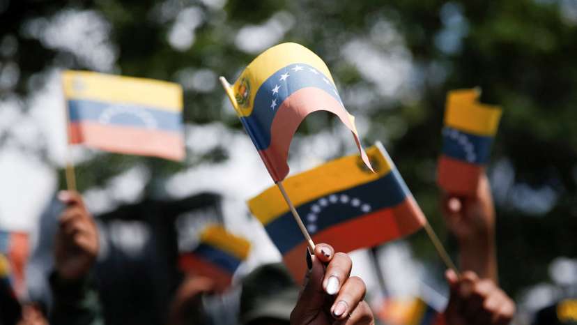 Government supporters participate in a women's march, in Caracas