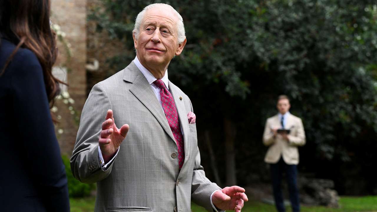 Royal tour artist Fraser Scarfe observes and illustrates King Charles III in the gardens of Villa Wolkonsky, in Rome