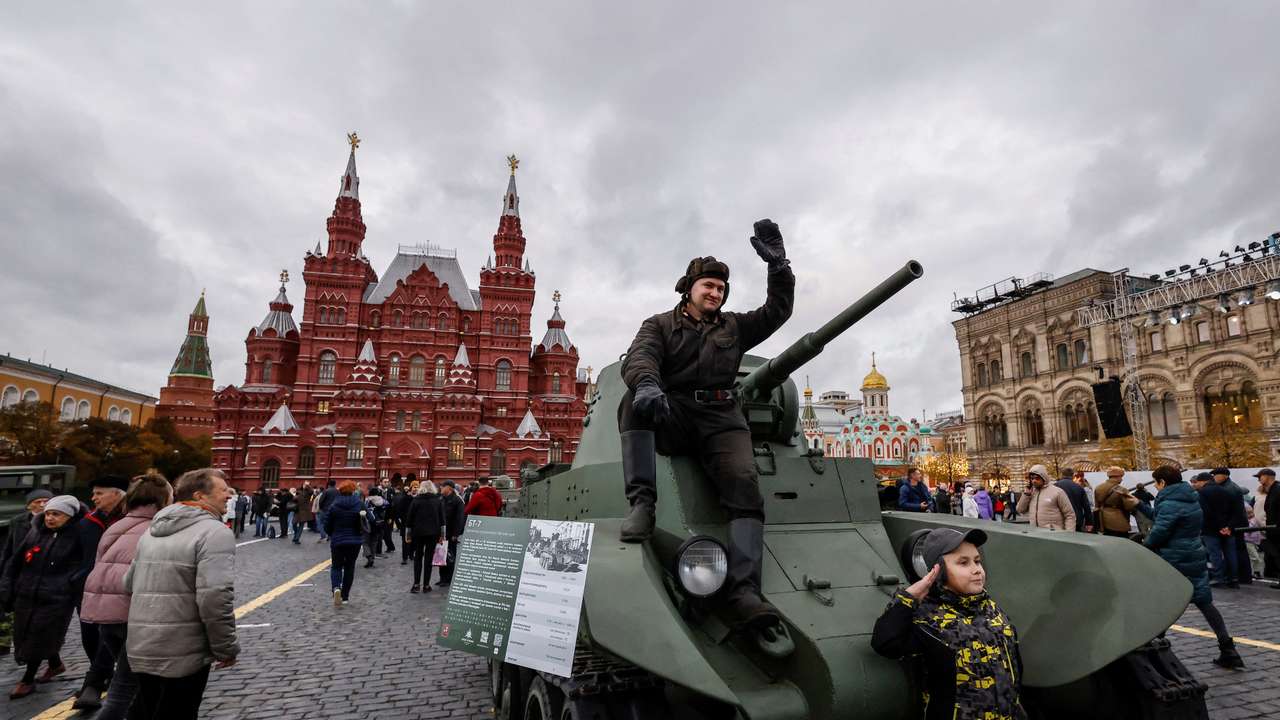 People attend an exhibition marking the anniversary of 1941 historical parade in Moscow