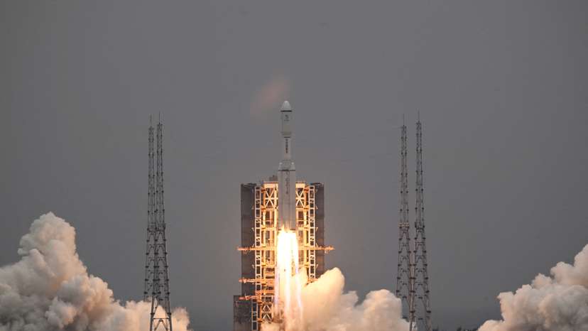 FILE PHOTO: Long March-8 rocket, carrying the relay satellite Queqiao-2 for Earth-Moon communications, blasts off in Hainan