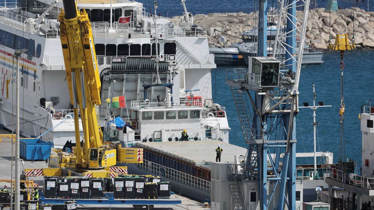 Humanitarian aid for Gaza is loaded on a cargo ship in the port of Larnaca