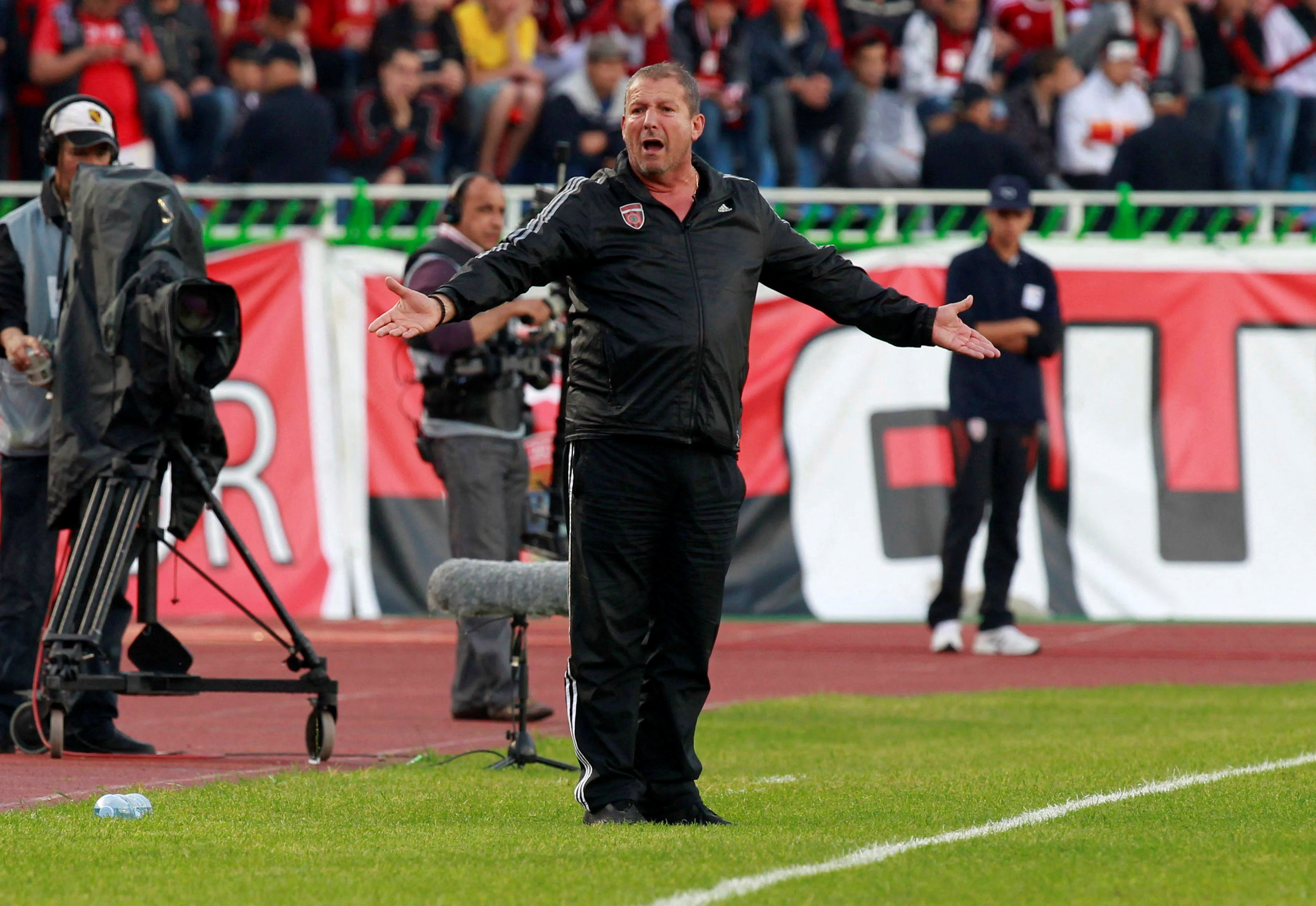 FILE PHOTO: Courbis of Algeria's USM Alger gestures during the UAFA final soccer match against Kuwait's Al-Arabi in Algiers
