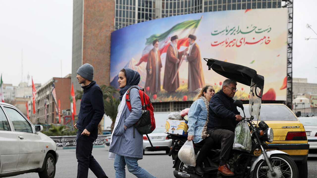 A banner of Iran's new supreme leader Mojtaba Khamenei with late supreme leader Ayatollah Ali Khamenei, in Tehran