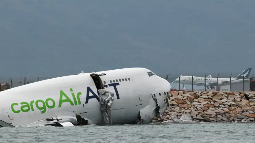 A cargo plane skids off the runway during landing at Hong Kong International Airport