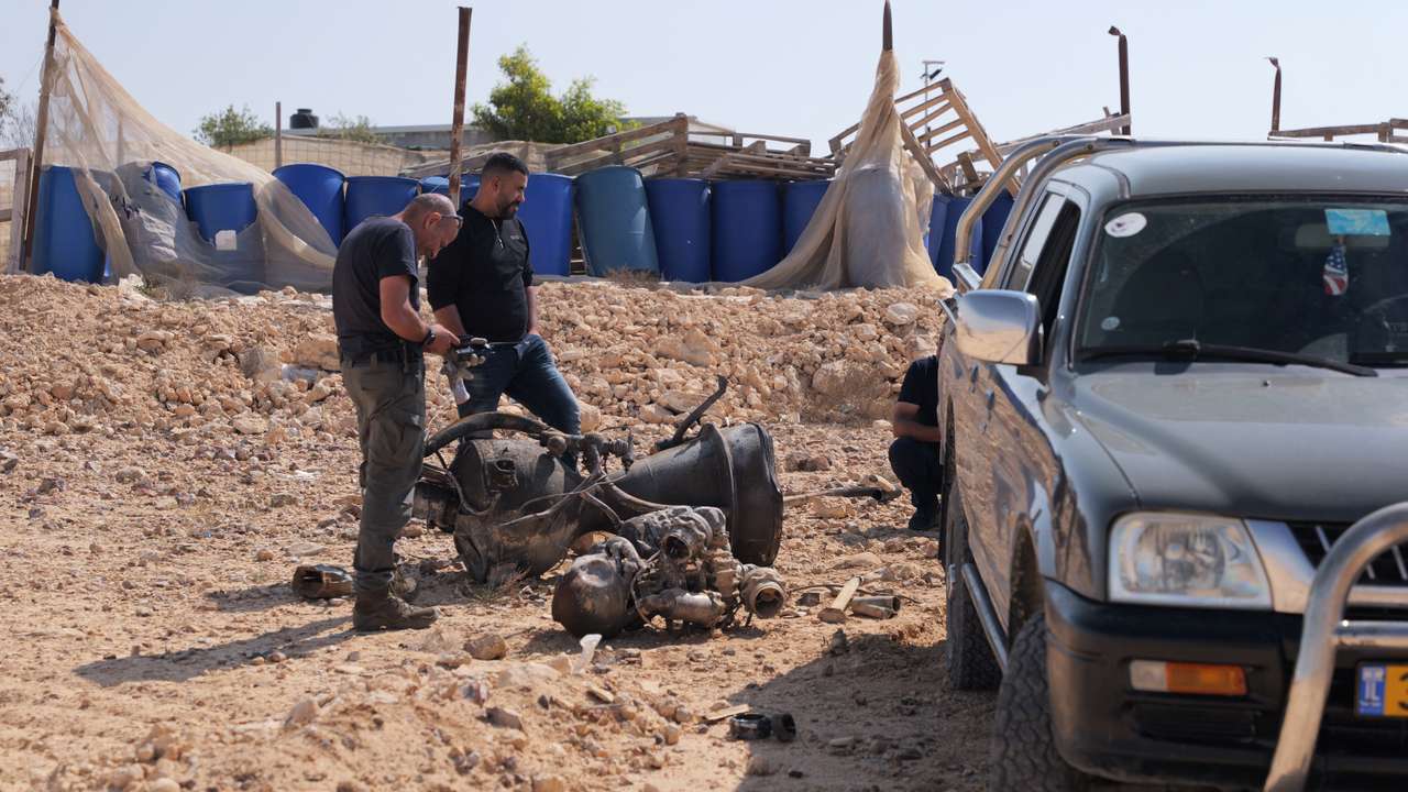 The remains of a rocket booster that, according to Israeli authorities critically injured a 7-year-old girl, after Iran launched drones and missiles towards Israel, near Arad