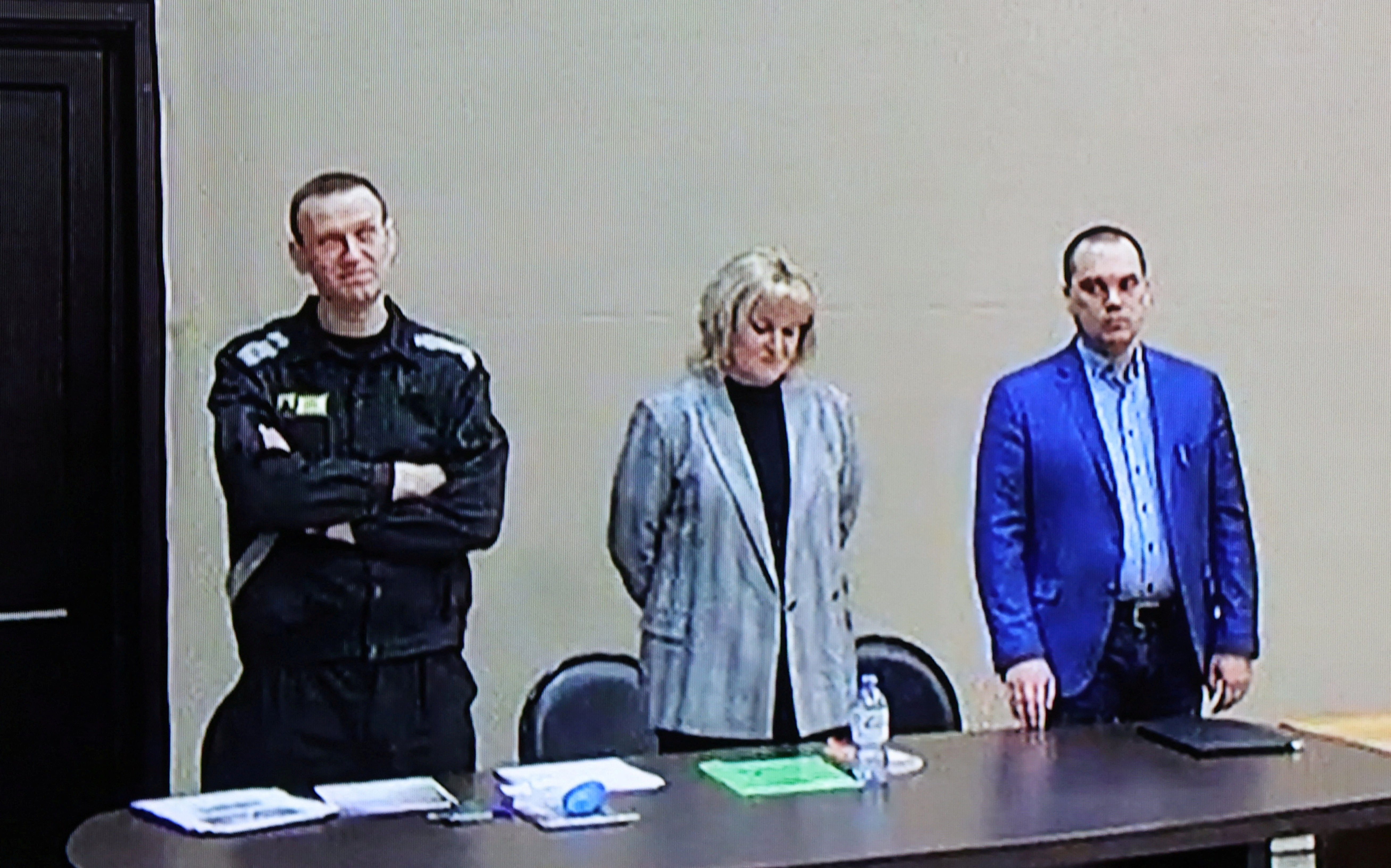 FILE PHOTO: Jailed Russian opposition leader Alexei Navalny attends a court hearing in Pokrov