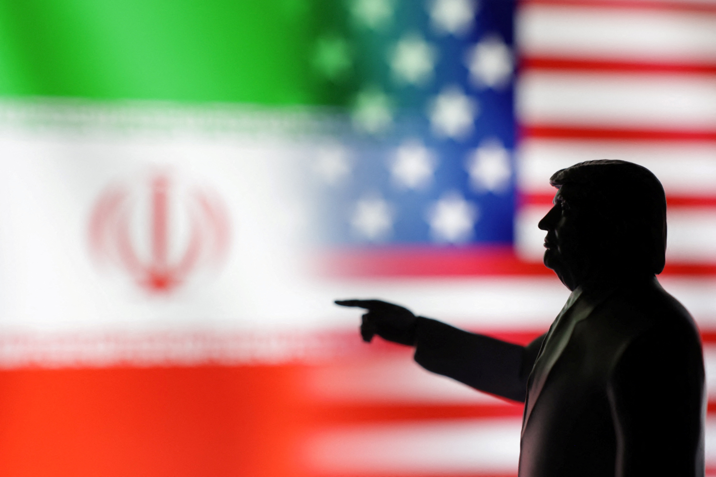 Illustration shows 3D-printed miniature model depicting U.S. President Donald Trump, Iranian and U.S. flags
