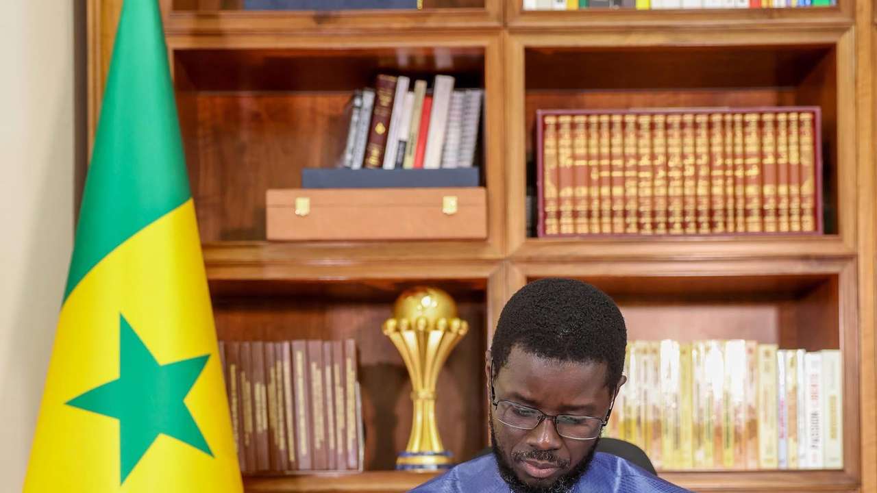 Senegalese President Bassirou Diomaye posted a photo with the AFCON trophy behind him