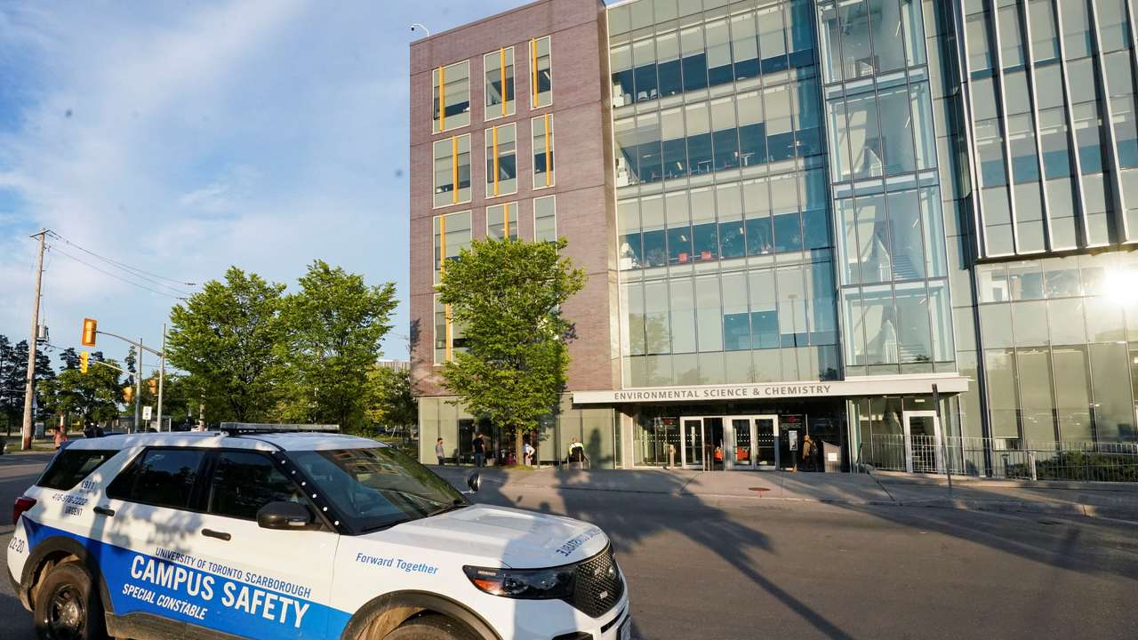 A police vehicle is parked outside of the University of Toronto's Scarborough Campus after police say during a press conference that they detonated a hoax explosive device, in Toronto
