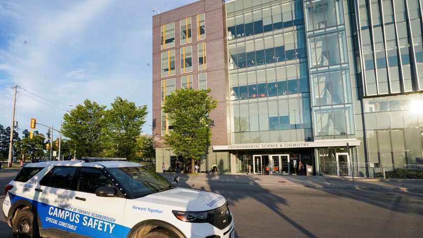 A police vehicle is parked outside of the University of Toronto's Scarborough Campus after police say during a press conference that they detonated a hoax explosive device, in Toronto