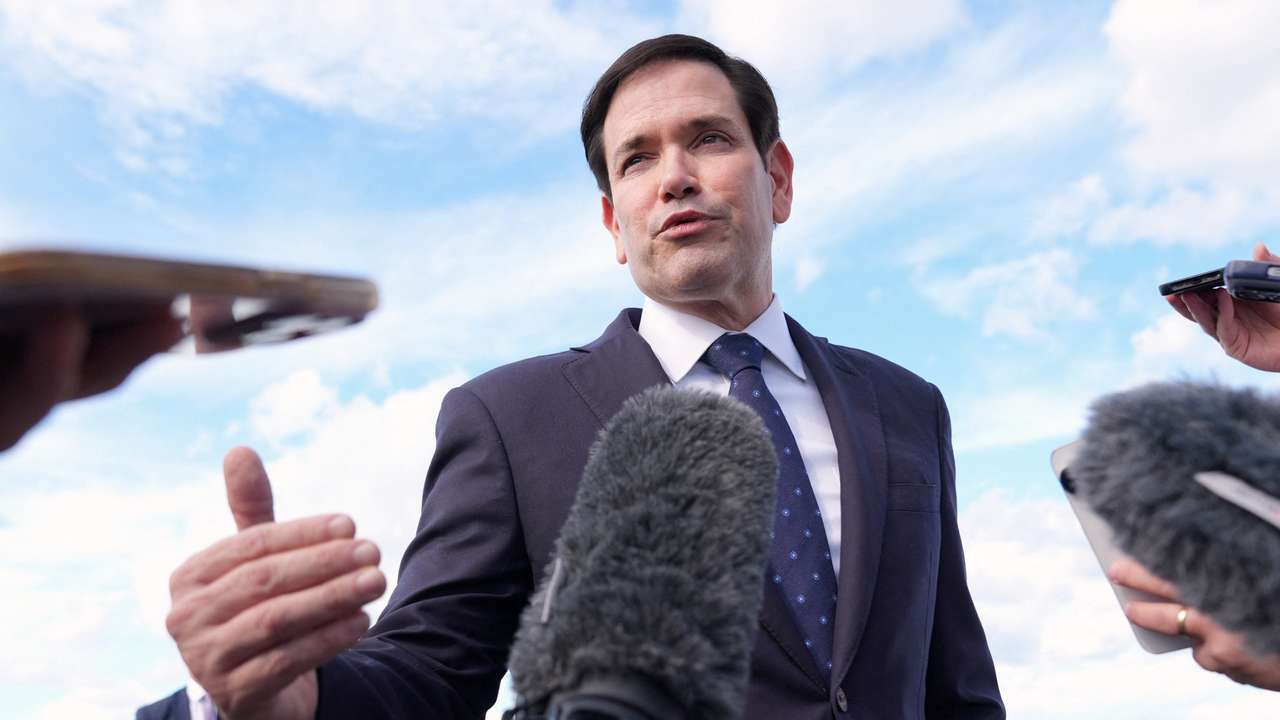 U.S. Secretary of State Marco Rubio speaks to reporters before boarding his plane at Homestead Air Reserve Base in Homestead