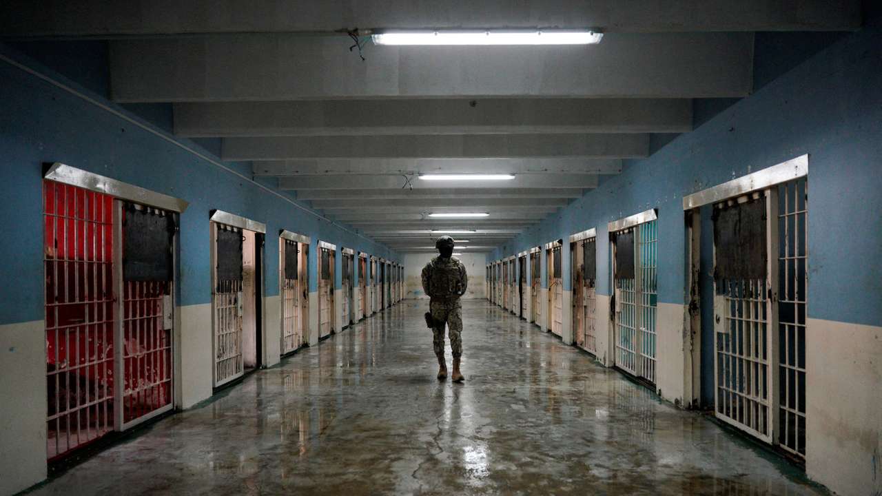 FILE PHOTO: A member of the military walks through a recently reconditioned area of the Penitenciaria del Litoral prison, in Guayaquil, Ecuador April 9, 2025. REUTERS/Santiago Arcos/File Photo