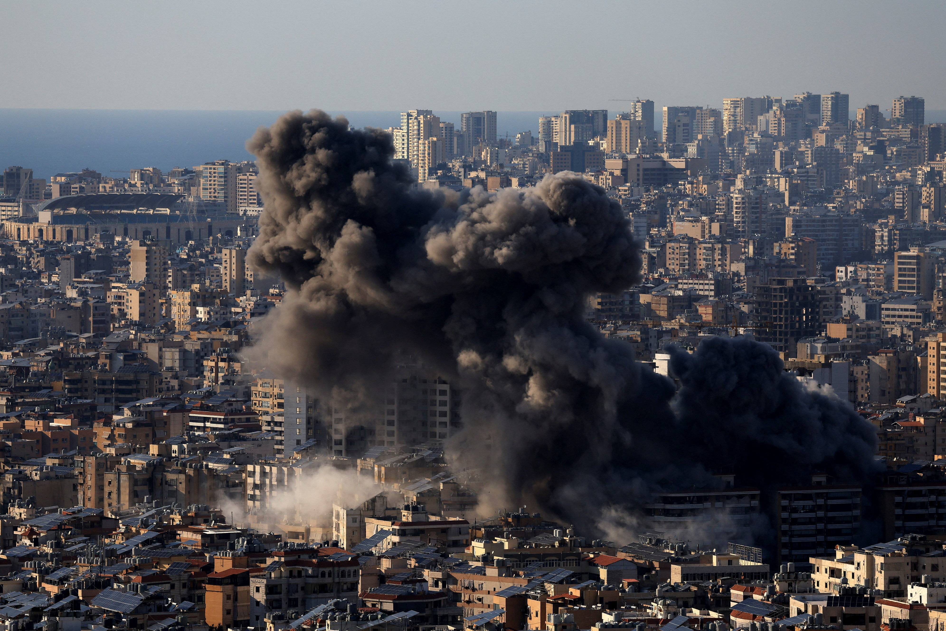 Smoke billows after an Israeli strike on Beirut's southern suburbs