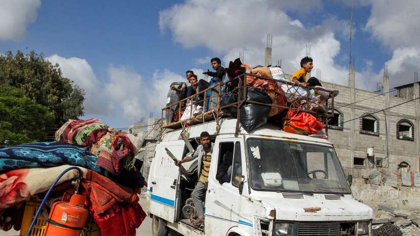 Palestinians flee Rafah after Israeli forces launched a ground and air operation in the eastern part of the southern Gaza city