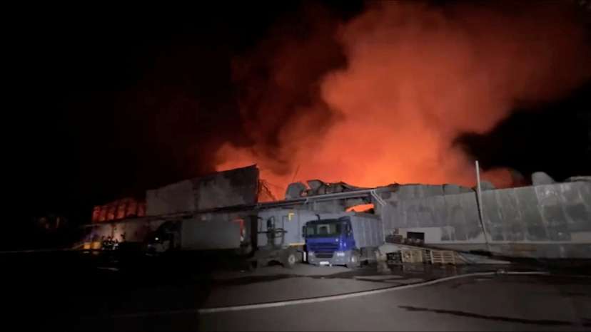 Smoke rises following a Russian ballistic missile that struck a postal depot at a location given as Odesa