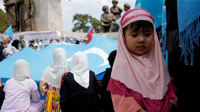 Ethnic Uyghur demonstrators take part in a protest against China, in Istanbul