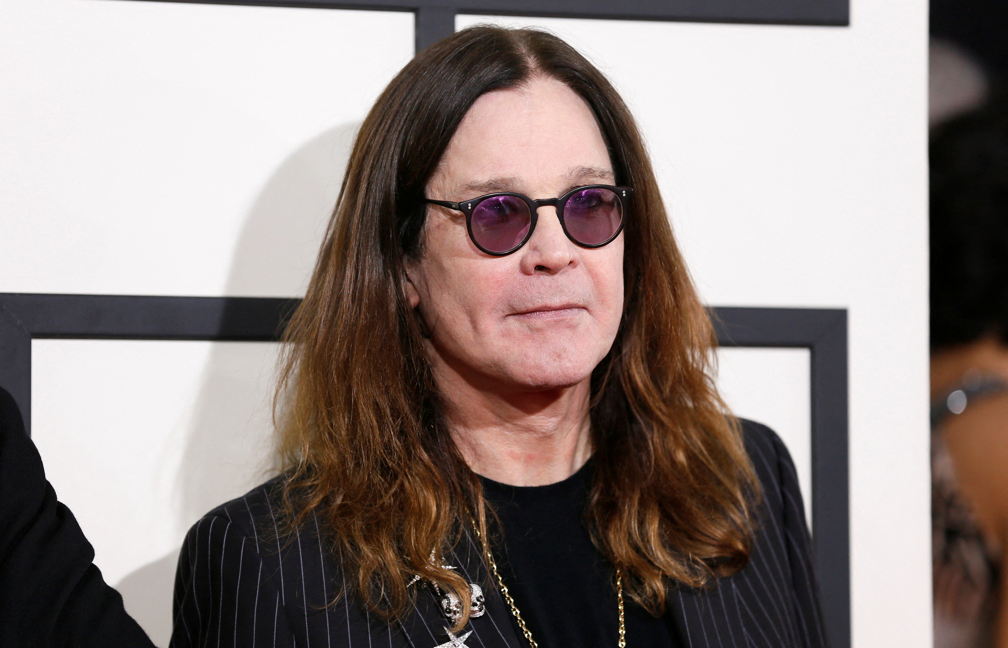 FILE PHOTO: Ozzy Osbourne of the heavy metal band Black Sabbath arrives at the 56th annual Grammy Awards in Los Angeles