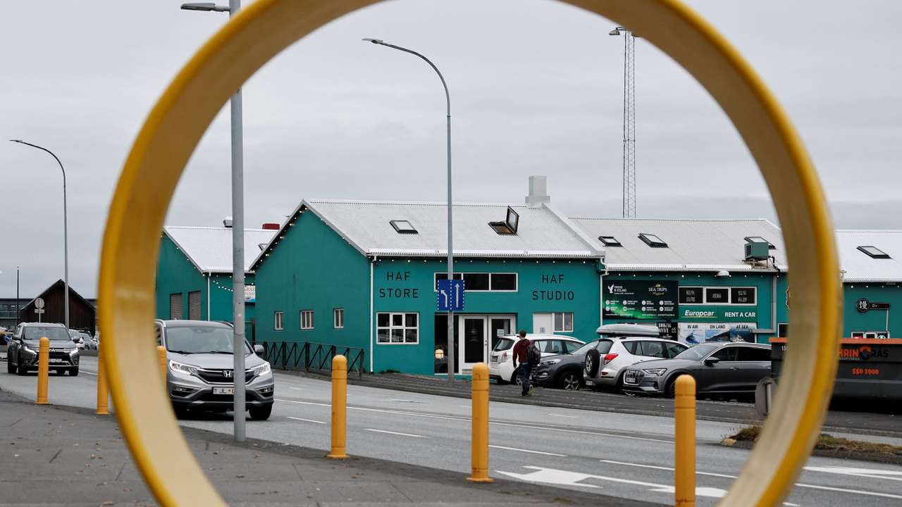 Cars are parked on the Old Harbour area of Reykjavik