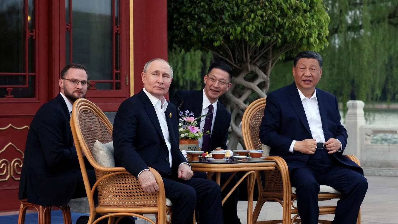 Putin and Xi wrap up talks with tea ceremony in a Beijing park
