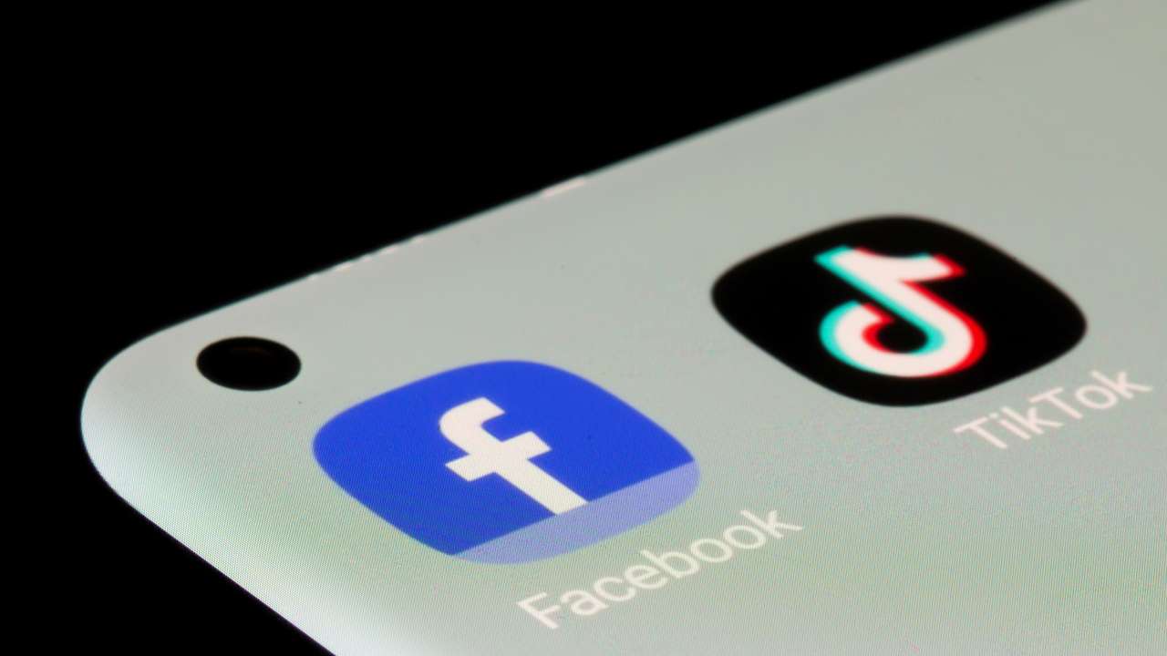 FILE PHOTO: Facebook, TikTok apps are seen on a smartphone in this illustration