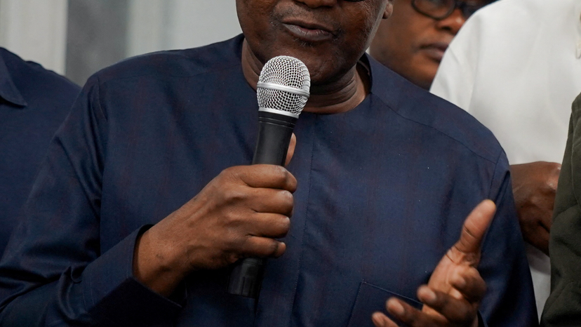 Dangote Group chief executive Aliko Dangote addresses workers and members of Nigeria's House of Representatives at Dangote Petroleum Refinery control room in Lagos