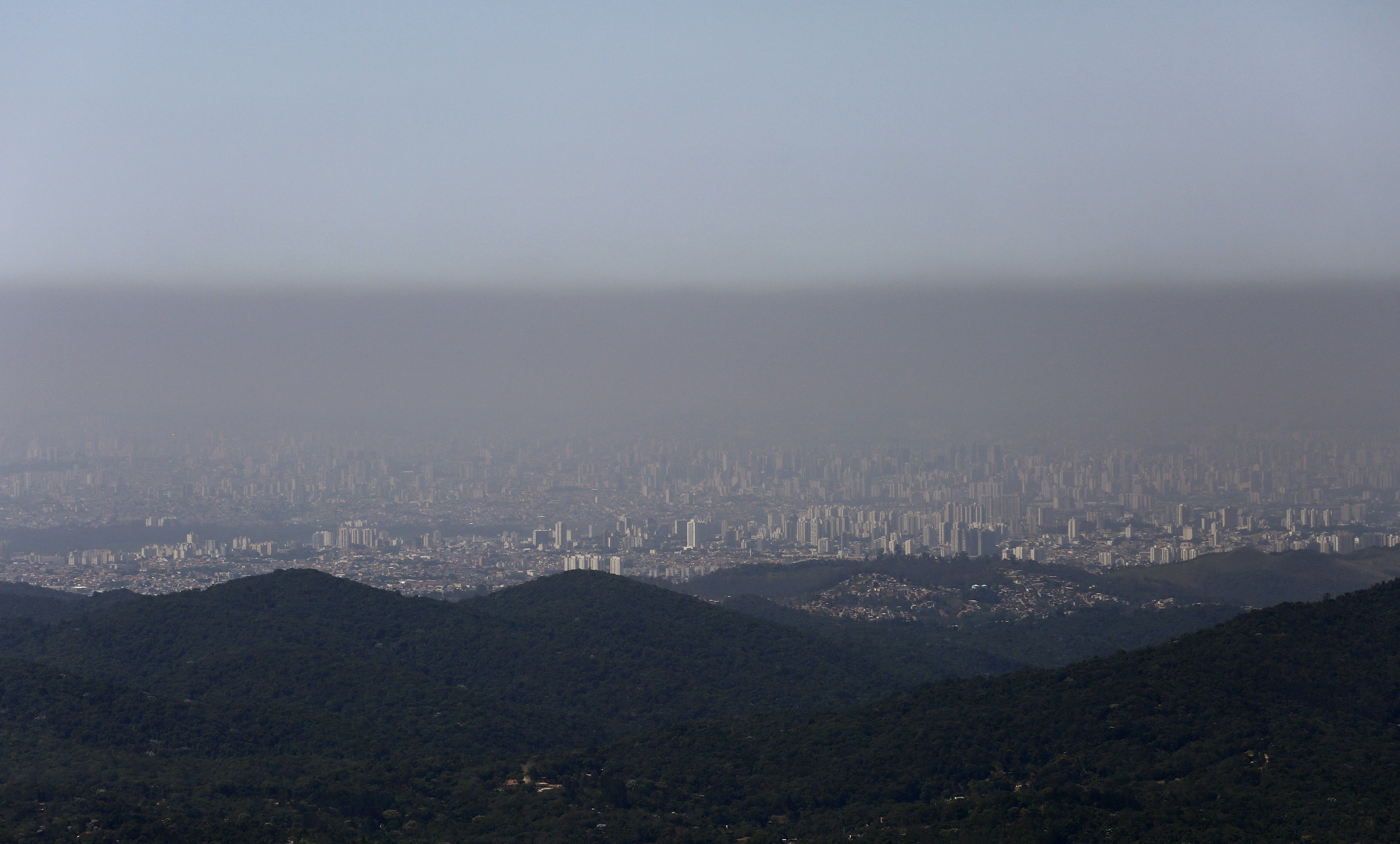 gBuildings are seen amid a layer of smog in the city of Sao Paulo