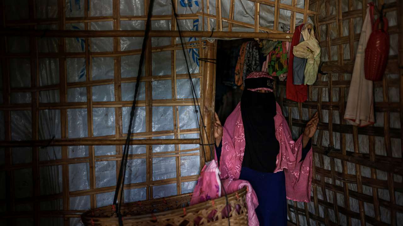Begum, 35-year-old mother of seven children, who is marrying off one of her daughters following the funding shortage, poses for a picture, in Cox's Bazar